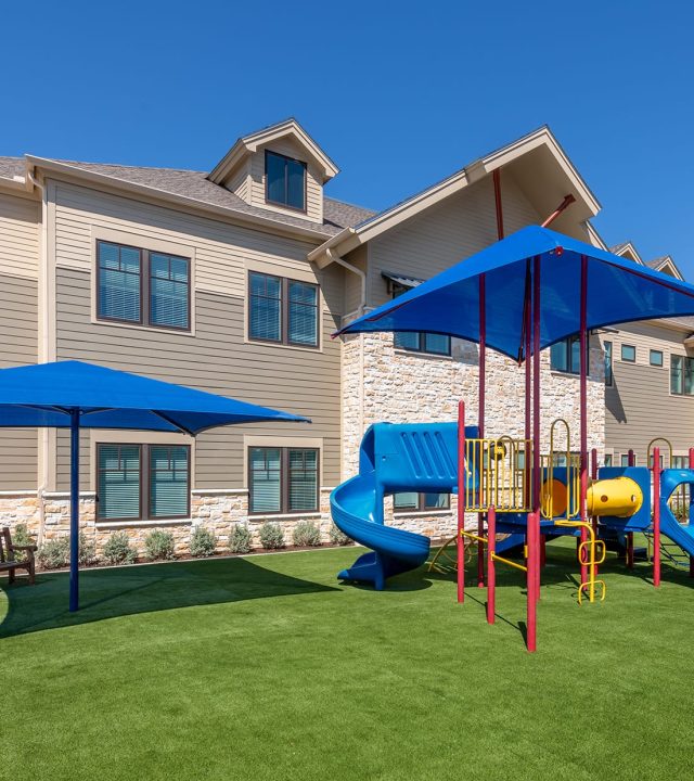 Dallas Ronald McDonald House building with outdoor playground